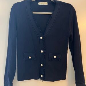 Fringed Navy Cardigan with Gold rimmed Pearl Buttons.